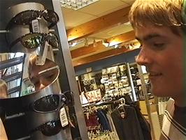 Luke checks out the sunglasses in Nevisport, Fort William, as he needs a pair for use at home